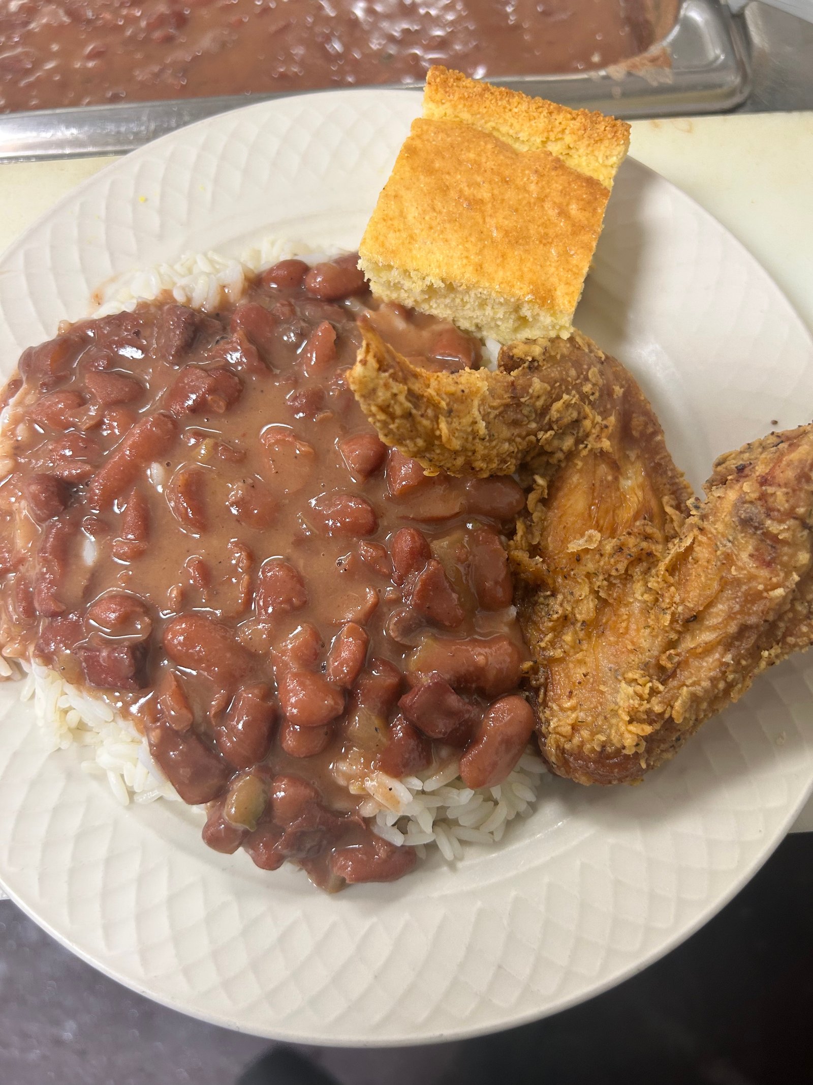 Red beans and rice with fried chicken and cornbread